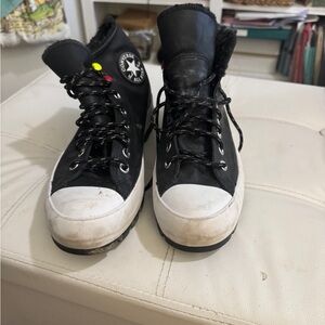Converse Black and White High-Tops with Unique Accents